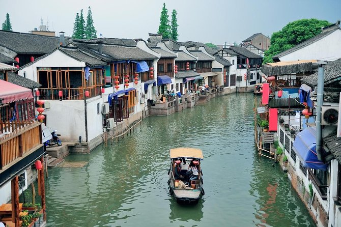 Shanghai Day Tour to Zhujiajiao Water Town, Yu Garden, Bazaar, Bund - Key Takeaways