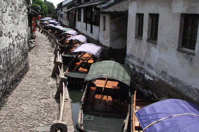 Mini Group: One-Day Zhouzhuang and Jinxi Water Town Tour - Itinerary Overview