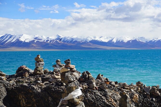 9 Days Lhasa Gyantse Shigatse Everest Namtso Group Tour - Altitude Adjustment and Guide Insights